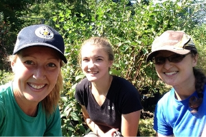 LEAF staff smiling happily during a successful field day(© 2017 Mara McHaffie / LEAF)