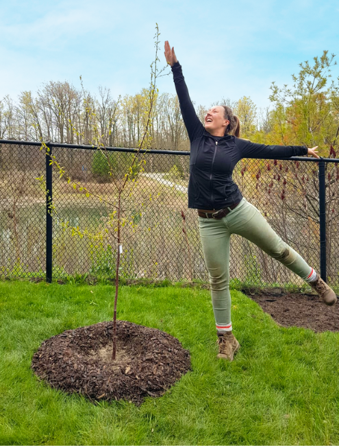 LEAF staff posing with a tree